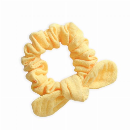 Gumka muślinowa z kokardką -  żółta pastelowa 